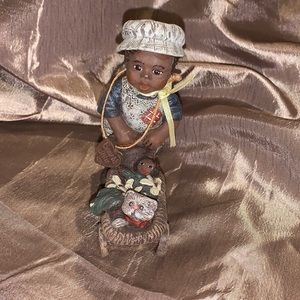 Sarah’s Attic figuring PANSY pushing babydoll carriage, # 2796, date 1990